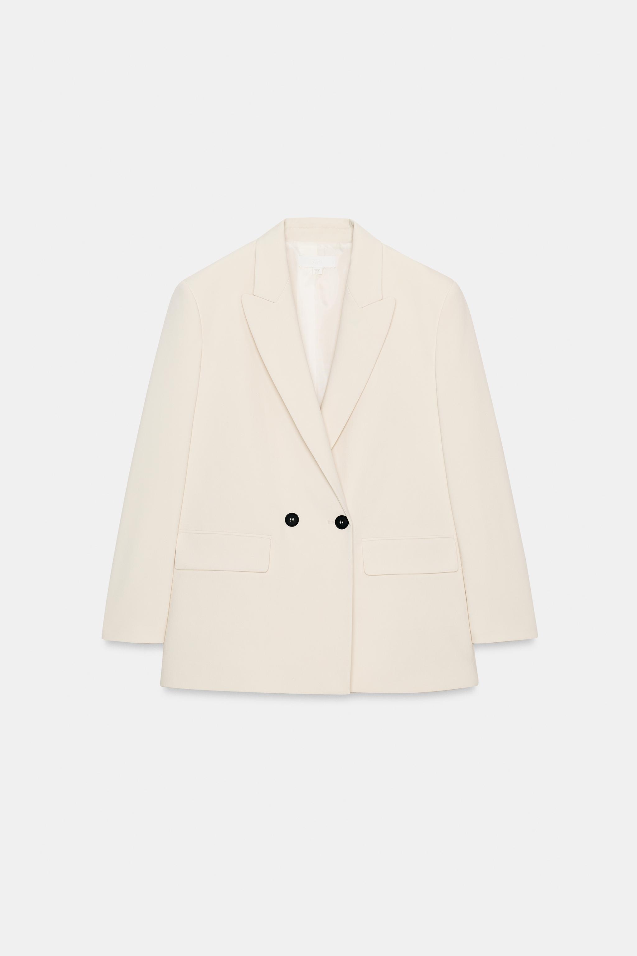 VESTE OVERSIZE À BOUTONNAGE CROIS